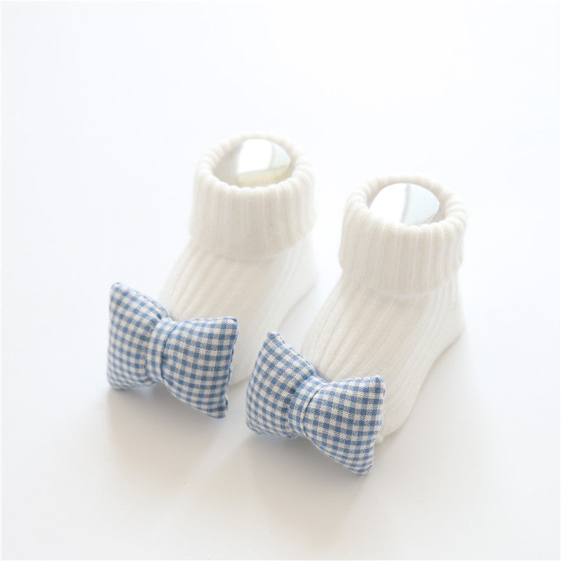 Tiny Steps Socks soft cotton baby socks with blue checkered bows for infants.