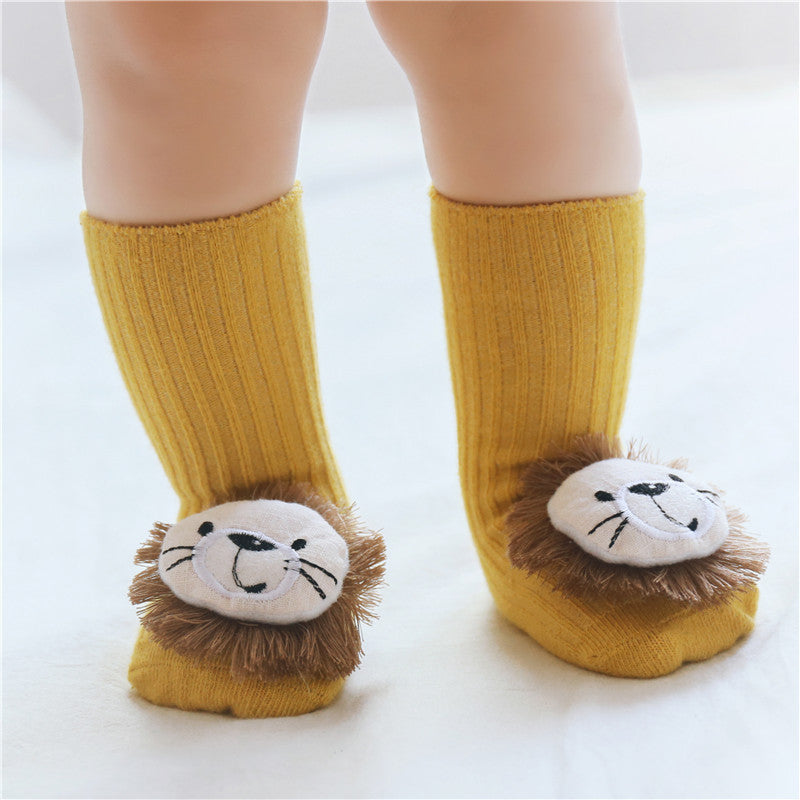 Tiny Steps Socks featuring adorable lion design, soft cotton fabric, perfect for keeping little feet warm.