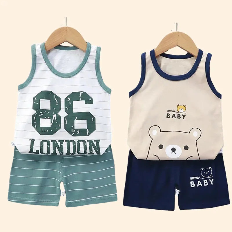 Kids summer outfit set featuring cotton sleeveless tank tops and shorts with playful cartoon designs.
