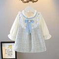 Girls long sleeve dress with cute bow and ruffled details, perfect for casual spring outfits.