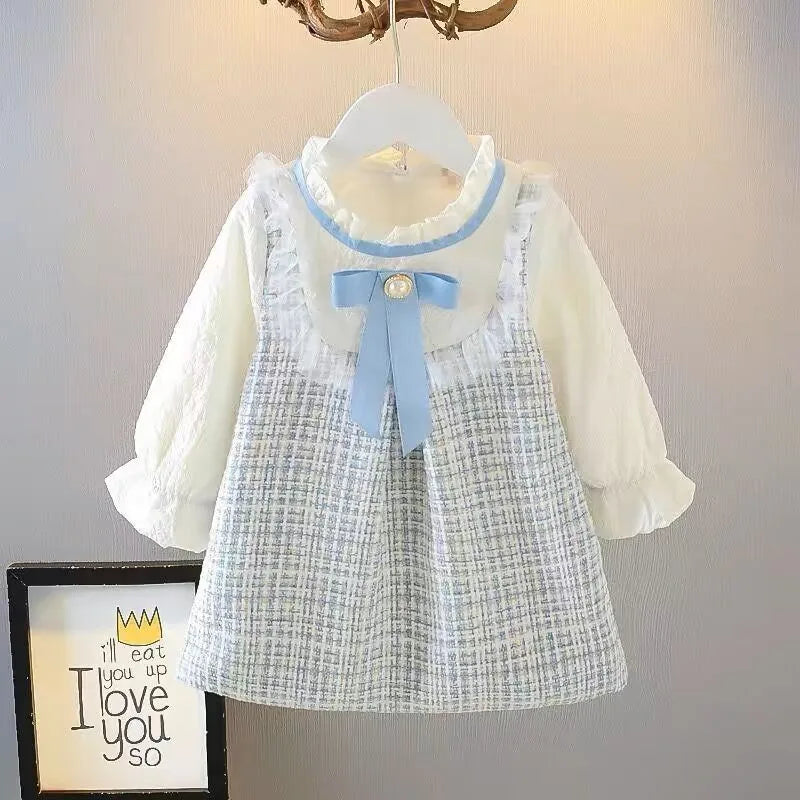 Girls long sleeve dress featuring a cute bow, casual spring style, knee-length, and cotton fabric.