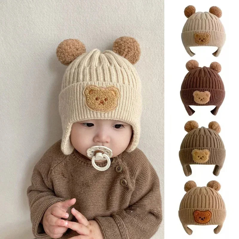 baby winter wool hat with bear ears worn by a baby, showcasing various color options and cute bear ears design.